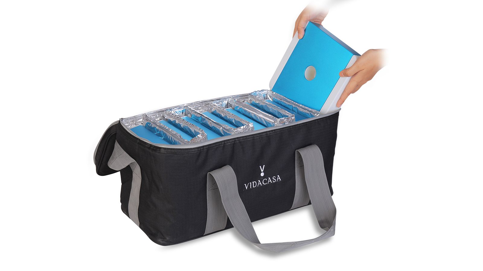 A carrier bag open, loaded with cold cells