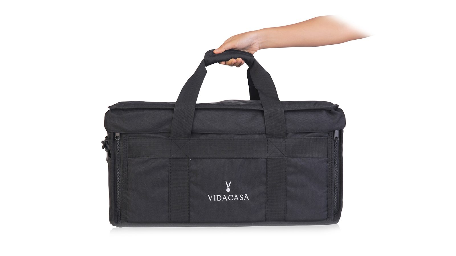 Hand lifting a black GN 1/1 VIDACASA carrier bag