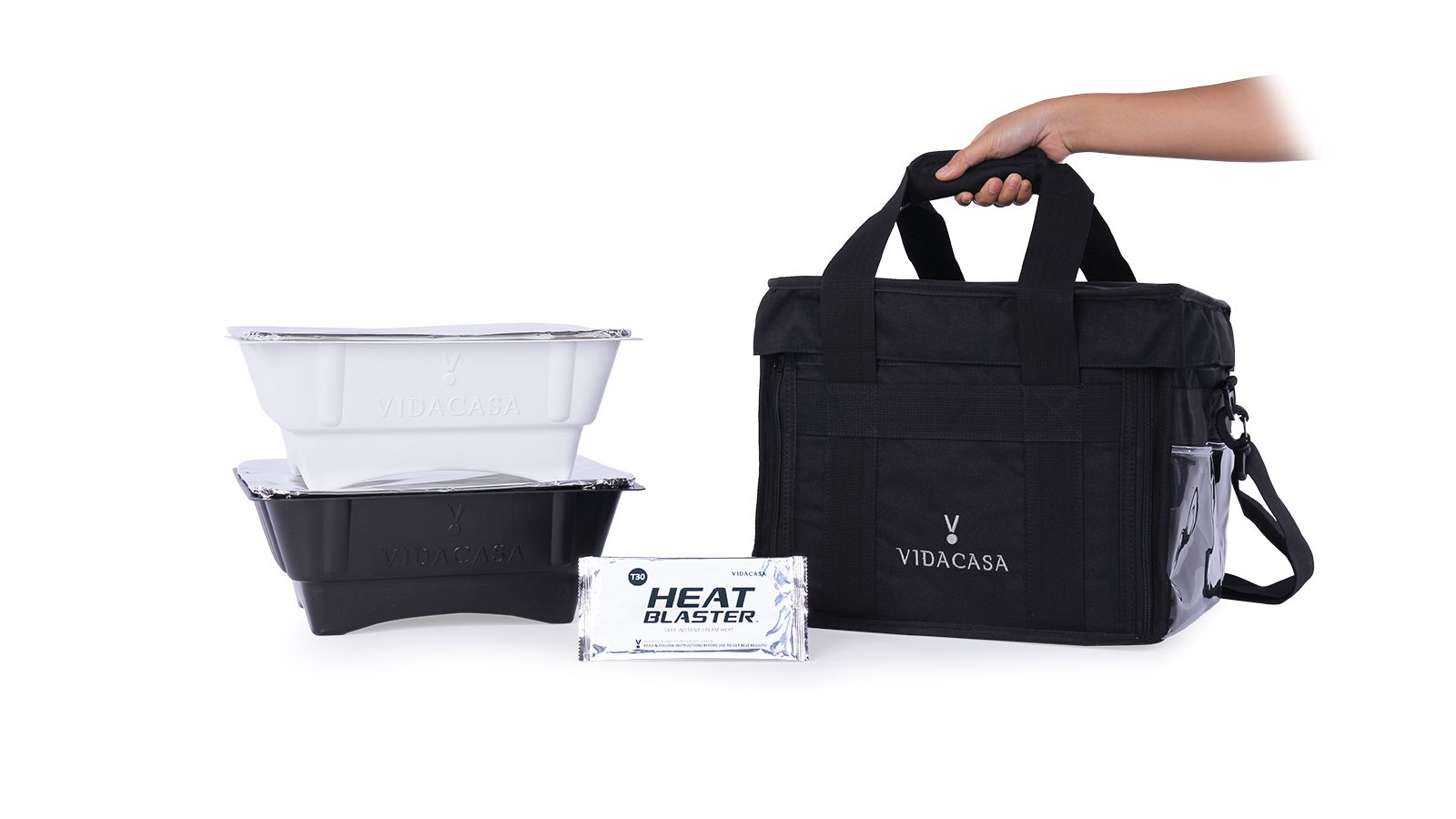 A GN 1/2 carrier bag beside a set and a heat pack